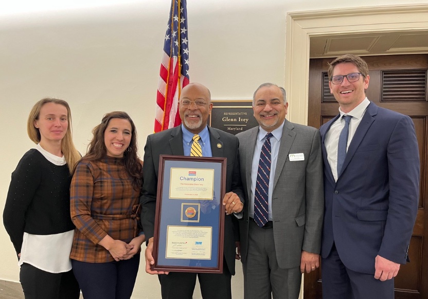 A photo of U.S. Representative Glenn Ivey (center) with chief leaders from Melwood