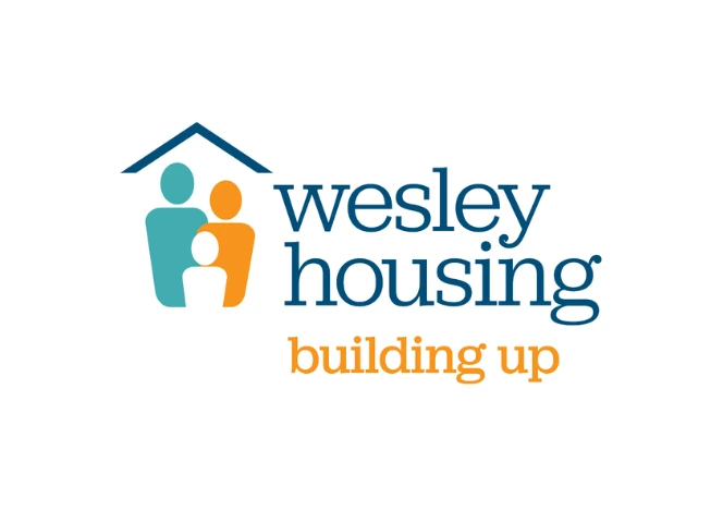 Wesley Housing logo