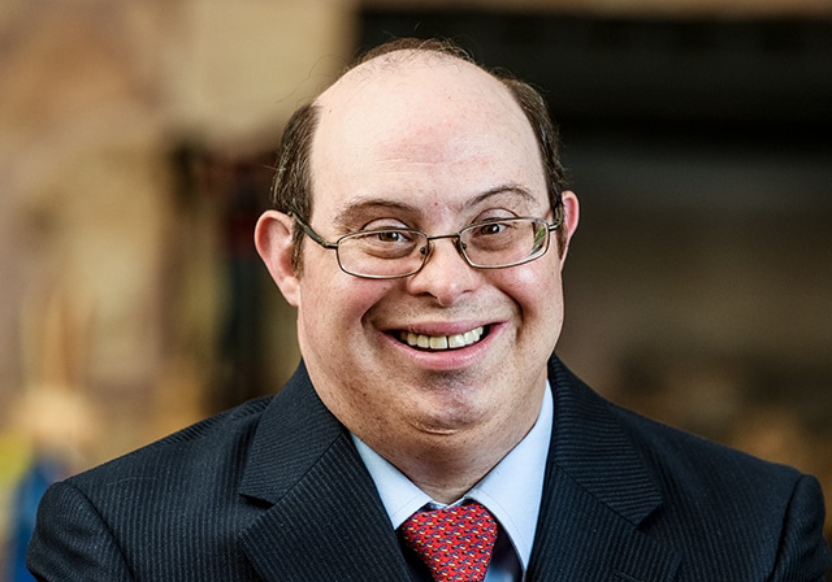 David Egan, board member, head and shoulders photo, wearing glasses and suit