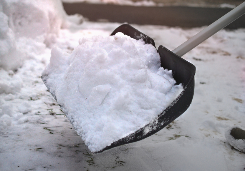 closeup photo of snow shovel shoveling snow