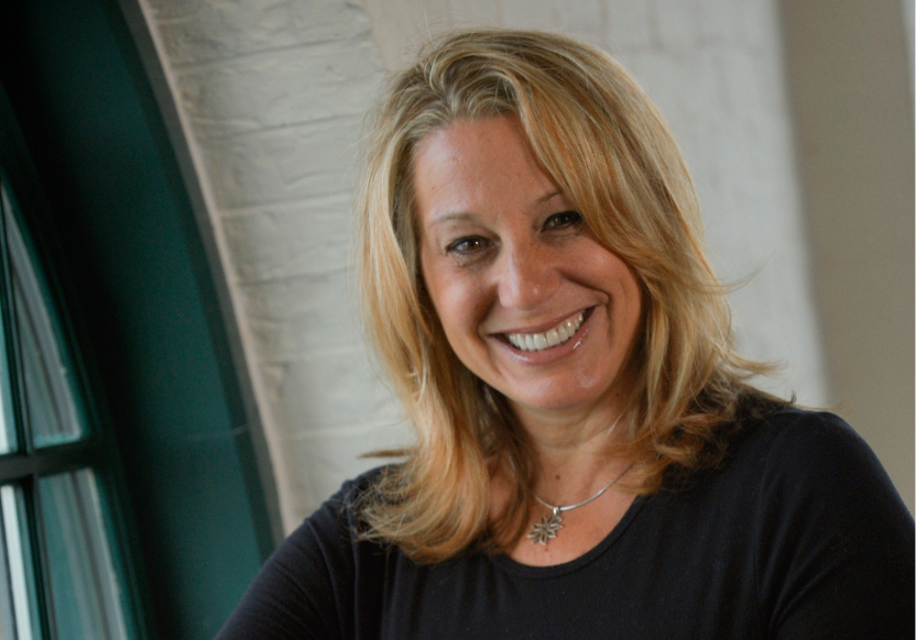 head shot of a smiling Cindy Plavier-Truitt